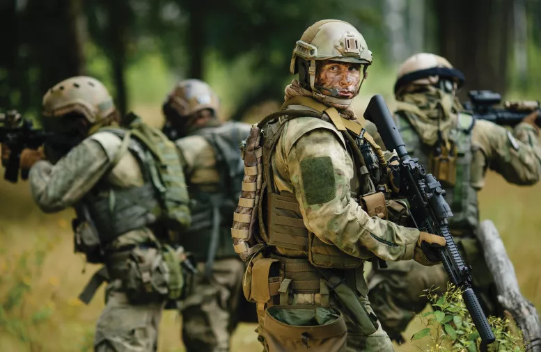 Military person looking back