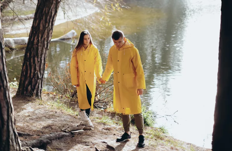 2 people wearing a raincoat
